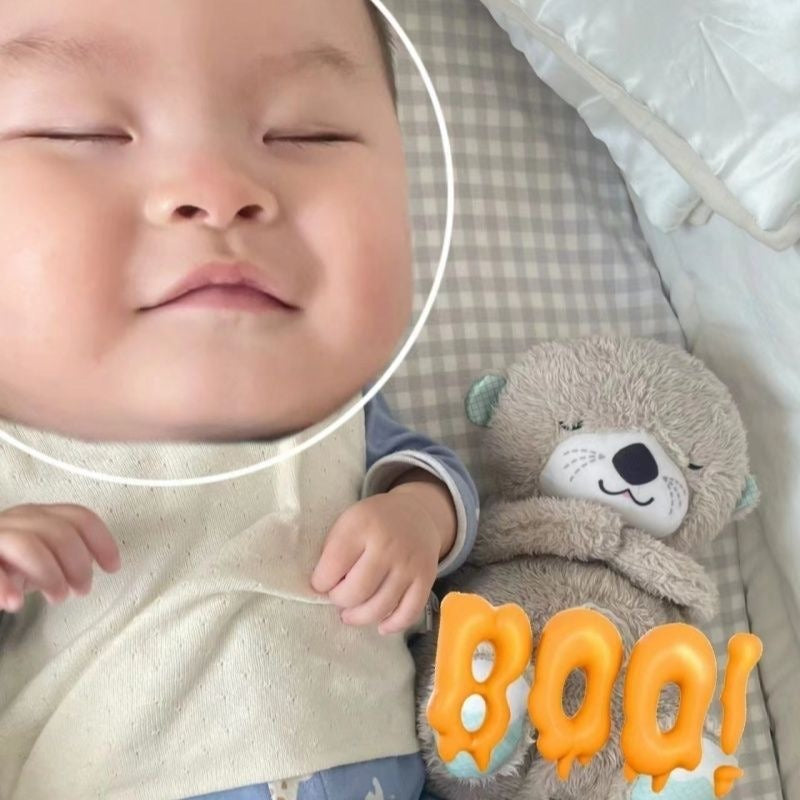 Peluche loutre apaisante et respirante avec berceuse